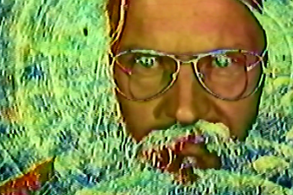 Jack's face being keyed through psychedelic colours, video still